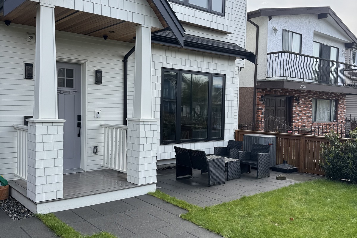House exterior after soft wash — clean siding and walkway